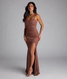 Own the spotlight in the Catherine Open Back Mermaid Glitter Formal Dress, a brown formal dress crafted to deliver luxe style for summer weddings, Army Balls, or any special event.
