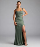 Step into summer looking effortlessly chic in the Catherine Open Back Mermaid Glitter Formal Dress in olive green, a must-have Windsor dress for your warm-weather wardrobe.