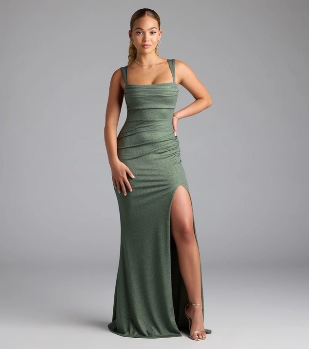 Step into summer looking effortlessly chic in the Catherine Open Back Mermaid Glitter Formal Dress in olive green, a must-have Windsor dress for your warm-weather wardrobe.