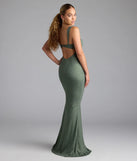Step into summer looking effortlessly chic in the Catherine Open Back Mermaid Glitter Formal Dress in olive green, a must-have Windsor dress for your warm-weather wardrobe.