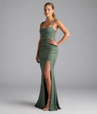 Step into summer looking effortlessly chic in the Catherine Open Back Mermaid Glitter Formal Dress in olive green, a must-have Windsor dress for your warm-weather wardrobe.