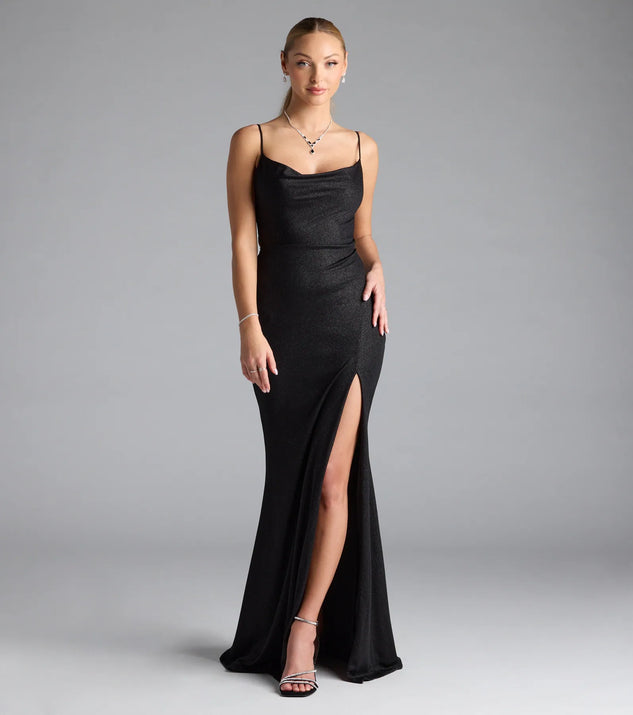 Turn heads at Prom 2025 in this black prom dress, where statement-making details meet the iconic style of the Mariam Lace-Up Slit Mermaid Glitter Formal Dress.