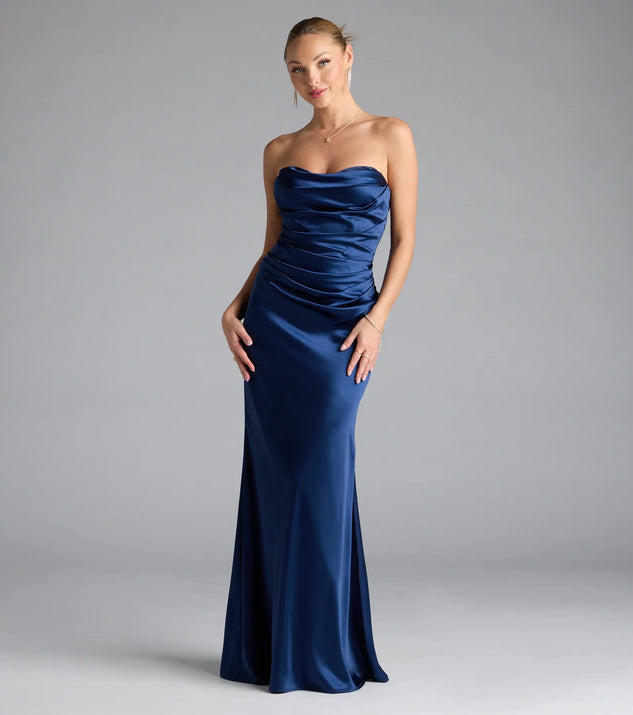 Turn heads at Prom 2025 in this navy blue prom dress, where statement-making details meet the iconic style of the Colette Strapless Mermaid Satin Formal Dress.