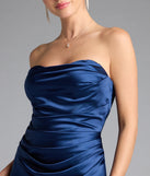 Turn heads at Prom 2025 in this navy blue prom dress, where statement-making details meet the iconic style of the Colette Strapless Mermaid Satin Formal Dress.
