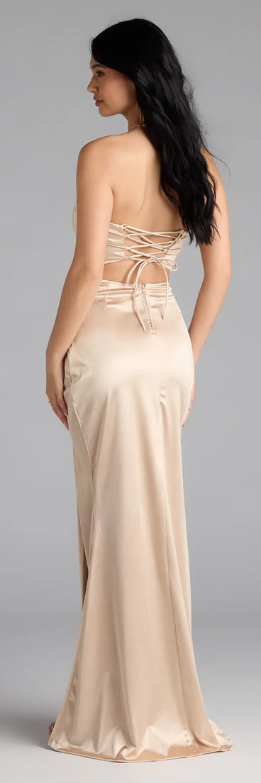Own the spotlight in the Elenora Lace-Up Mermaid Satin Formal Dress, a gold formal dress crafted to deliver luxe style for autumn weddings, Military Balls, or any special event.