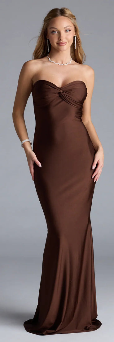 Own the spotlight in the Kimberly Strapless Tie-Back Mermaid Formal Dress, a brown formal dress crafted to deliver luxe style for autumn weddings, Military Balls, or any special event.