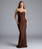 Turn heads at Prom 2025 in this brown prom dress, where statement-making details meet the iconic style of the Kimberly Strapless Tie-Back Mermaid Formal Dress.