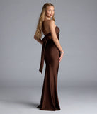 Turn heads at Prom 2025 in this brown prom dress, where statement-making details meet the iconic style of the Kimberly Strapless Tie-Back Mermaid Formal Dress.