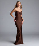 Turn heads at Prom 2025 in this brown prom dress, where statement-making details meet the iconic style of the Kimberly Strapless Tie-Back Mermaid Formal Dress.