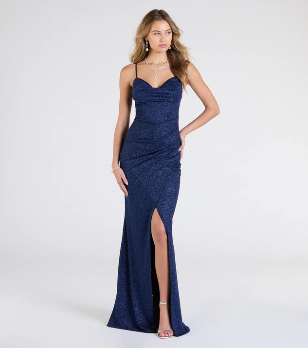 Step into the Prom 2025 dance in the Johanna Cowl Neck Slit Glitter Formal Dress in navy, a stunning blue prom dress designed to complement any theme with its timeless allure and statement-making style.