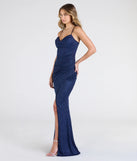 Step into the Prom 2025 dance in the Johanna Cowl Neck Slit Glitter Formal Dress in navy, a stunning blue prom dress designed to complement any theme with its timeless allure and statement-making style.