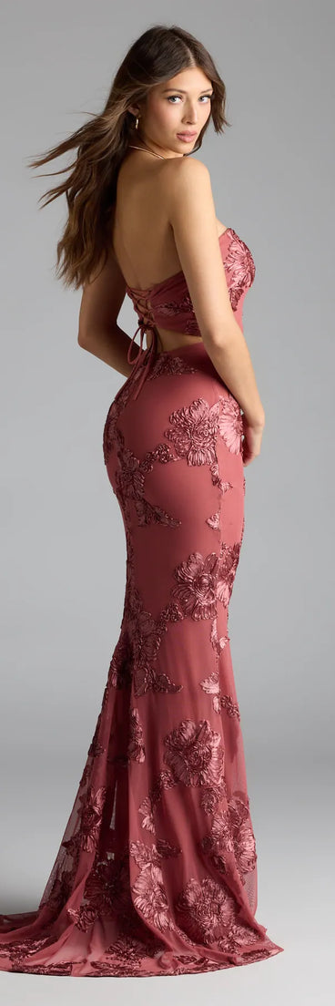 Own the spotlight in the Ariela Lace-Up Cutout Mermaid Formal Dress, a rose gold formal dress crafted to deliver luxe style for fall weddings, Army Balls, or any special event.
