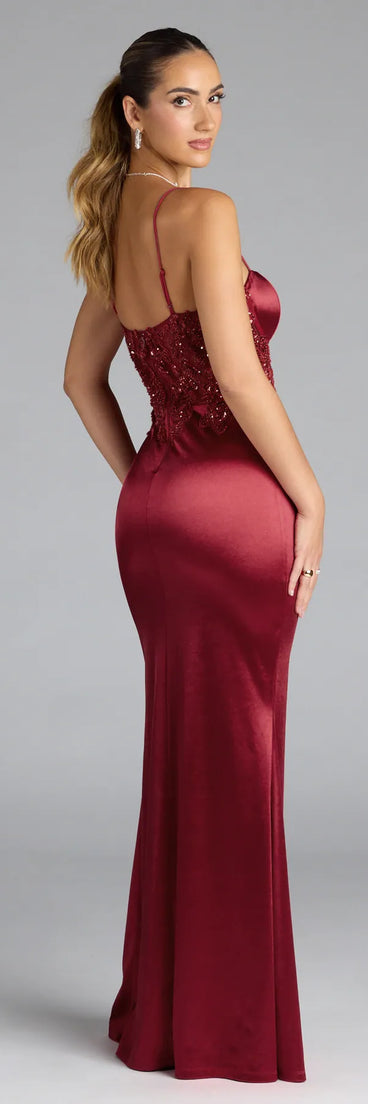 Turn heads at Prom 2025 in this wine prom dress, where statement-making details meet the iconic style of the Felicia Beaded Sequin Slit Satin Formal Dress.