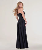 The Lindsey Strapless Slit A-Line Formal Dress is a show-stopping black prom dress, offering a sleek, slimming silhouette that enhances your natural beauty for an unforgettable night.