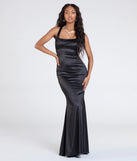 Own the spotlight in the Rosella Open Back Mermaid Satin Formal Dress, a black formal dress crafted to deliver luxe style for summer weddings, Army Balls, or any special event.