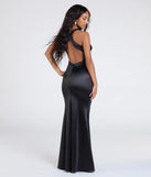 The Rosella Open Back Mermaid Satin Formal Dress is a show-stopping black prom dress, offering a sleek, slimming silhouette that enhances your natural beauty for an unforgettable night.