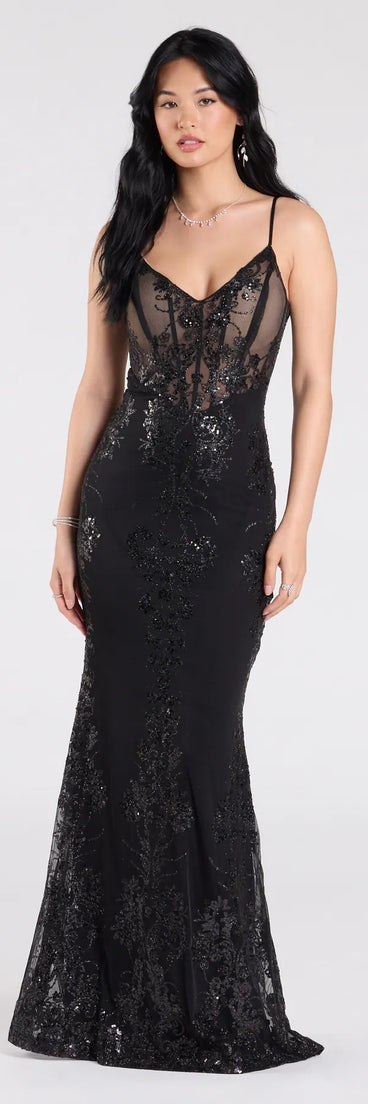 Own the spotlight in the Lindsay Corset Mermaid Sequin Glitter Formal Dress, a black formal dress crafted to deliver luxe style for autumn weddings, Military Balls, or any special event.