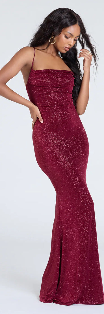 Own the spotlight in the Joan Lace-Up Mermaid Glitter Formal Dress, a wine formal dress crafted to deliver luxe style for autumn weddings, Military Balls, or any special event.