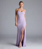 Turn heads at Prom 2025 in this lavender prom dress, where statement-making details meet the iconic style of the Madison Cowl Neck Slit Glitter Formal Dress.