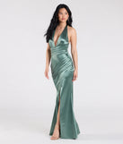 The Joanne Halter Slit Mermaid Satin Formal Dress in sage is a stunning green prom dress designed to capture attention with its fresh or bold color and effortlessly stylish silhouette.