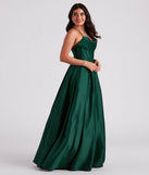Step into Prom 2025 in a hunter green prom dress, where unique Windsor accents and the standout Kayla Satin Cowl A-Line Ball Gown style come together.