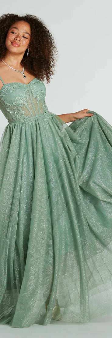 You'll look stunning in the Tia Sweetheart Lace Applique A-Line Ball Gown, a sage green formal dress designed to create an effortless yet standout look as women's formal attire, work party outfit, or military ball dress.