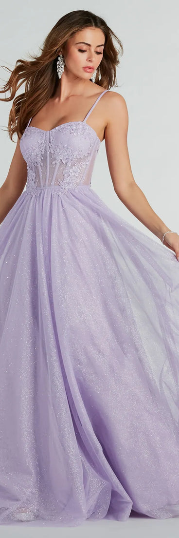 You'll look stunning in the Tia Sweetheart Lace Applique A-Line Ball Gown, a lavender formal dress designed to create an effortless yet standout look as women's formal attire, work party outfit, or military ball dress.