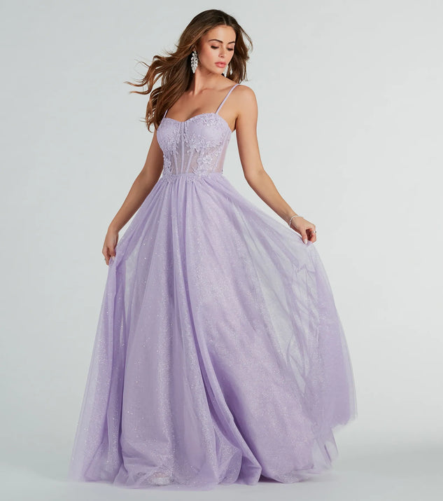 You'll look stunning in the Tia Sweetheart Lace Applique A-Line Ball Gown, a lavender formal dress designed to create an effortless yet standout look as women's formal attire, work party outfit, or military ball dress.