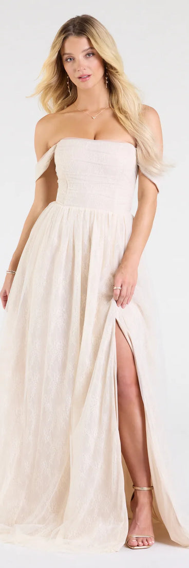 Own the spotlight in the Raelynn Off-The-Shoulder A-Line Lace Ball Gown, a ivory formal dress crafted to deliver luxe style for autumn weddings, Military Balls, or any special event.