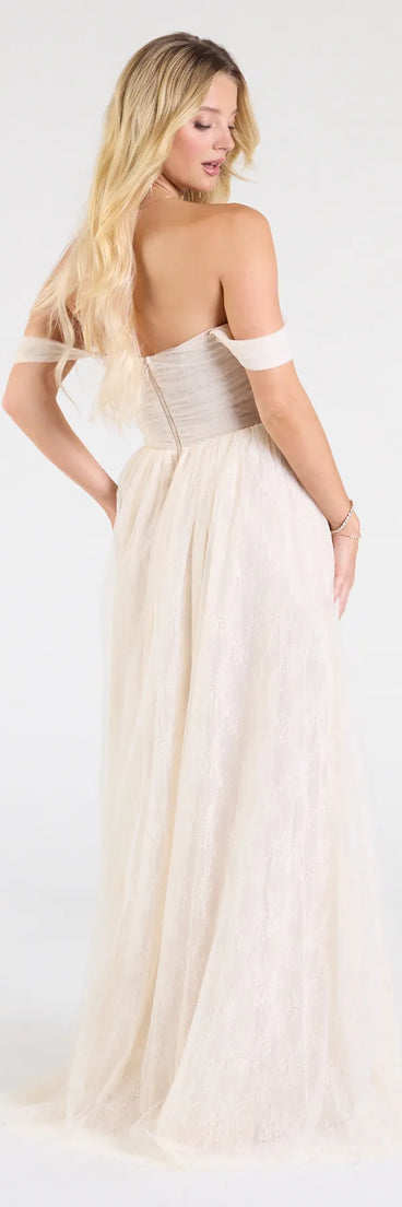 The Raelynn Off-The-Shoulder A-Line Lace Ball Gown in luxe ivory fabric, a stunning prom dress with statement details designed to make a bold impression at Prom 2025.