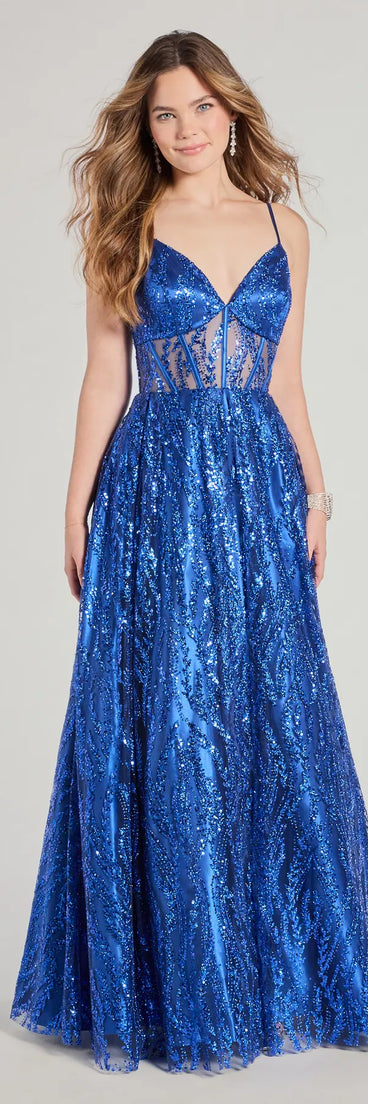 Own the spotlight in the Janet Bustier Lace-Up Glitter A-Line Ball Gown, a royal blue formal dress crafted to deliver luxe style for autumn weddings, Military Balls, or any special event.