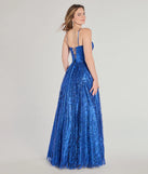 Step into the Prom 2025 dance in the Janet Bustier Lace-Up Glitter A-Line Ball Gown in royal, a stunning blue prom dress designed to complement any theme with its timeless allure and statement-making style.