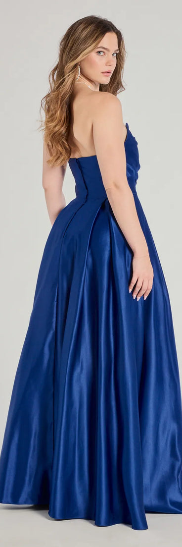 Step into the Prom 2025 dance in the Ruth Strapless Sweetheart A-Line Satin Ball Gown in royal, a stunning blue prom dress designed to complement any theme with its timeless allure and statement-making style.