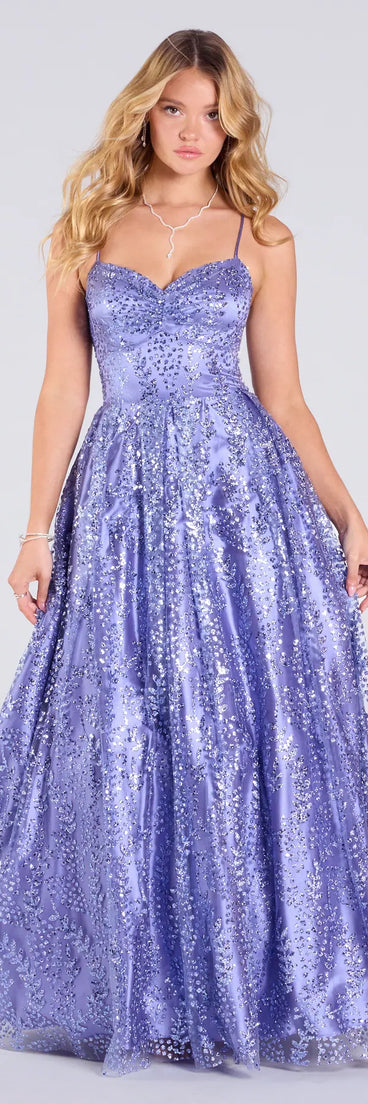 Make a bold statement in the Elsie Glitter Tulle Lace-Up Ball Gown in periwinkle, the perfect spring dress for weddings, cocktail hours, nights out, and/or seasonal celebrations.