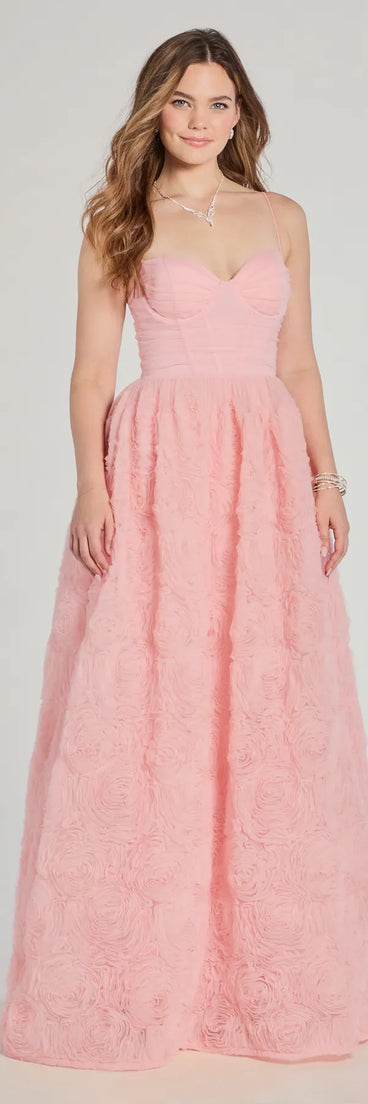 Own the spotlight in the Jayla Floral Rosette A-Line Ball Gown, a pink formal dress crafted to deliver luxe style for summer weddings, Army Balls, or any special event.
