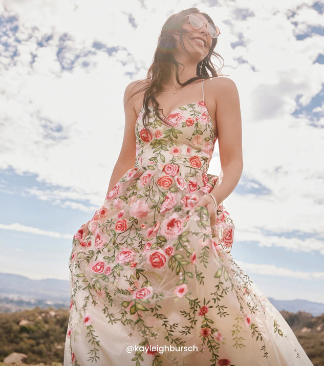 Make a bold statement in the Felicity Lace-Up A-Line Floral Tulle Ball Gown in nude, the perfect spring dress for weddings, cocktail hours, nights out, and/or seasonal celebrations.