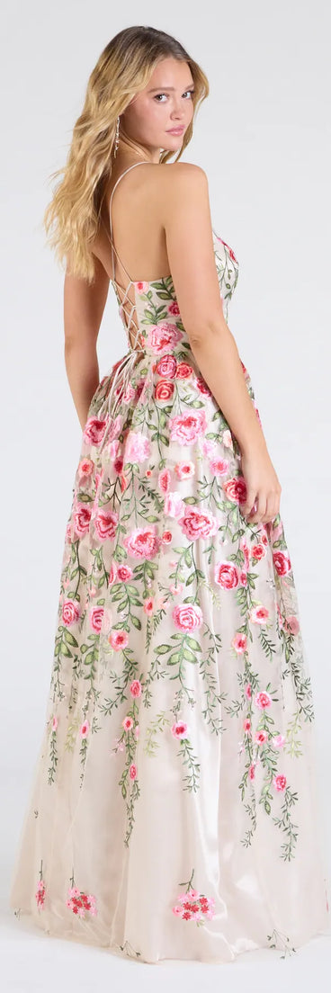 Make a bold statement in the Felicity Lace-Up A-Line Floral Tulle Ball Gown in nude, the perfect summer dress for weddings, cocktail hours, nights out, and/or seasonal celebrations.