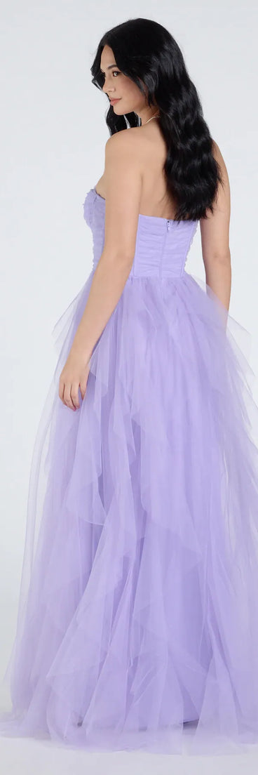 The Lindsey Bustier A-Line Ruffle Tulle Ball Gown in luxe lavender fabric, a stunning prom dress with statement details designed to make a bold impression at Prom 2025.