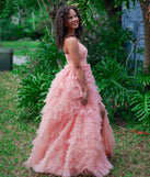 Turn heads at Prom 2025 in this coral prom dress, where statement-making details meet the iconic style of the Amabella Ruffled Glitter Tulle Ball Gown.