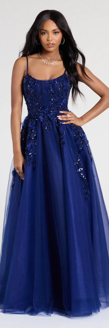 Turn heads at Prom 2025 in this navy blue prom dress, where statement-making details meet the iconic style of the Lula A-Line Sequin Floral Tulle Ball Gown.