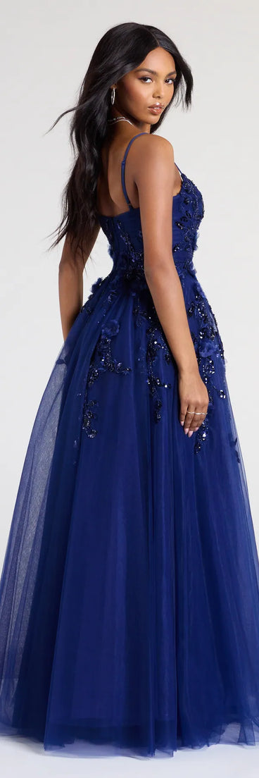 Turn heads at Prom 2025 in this navy blue prom dress, where statement-making details meet the iconic style of the Lula A-Line Sequin Floral Tulle Ball Gown.
