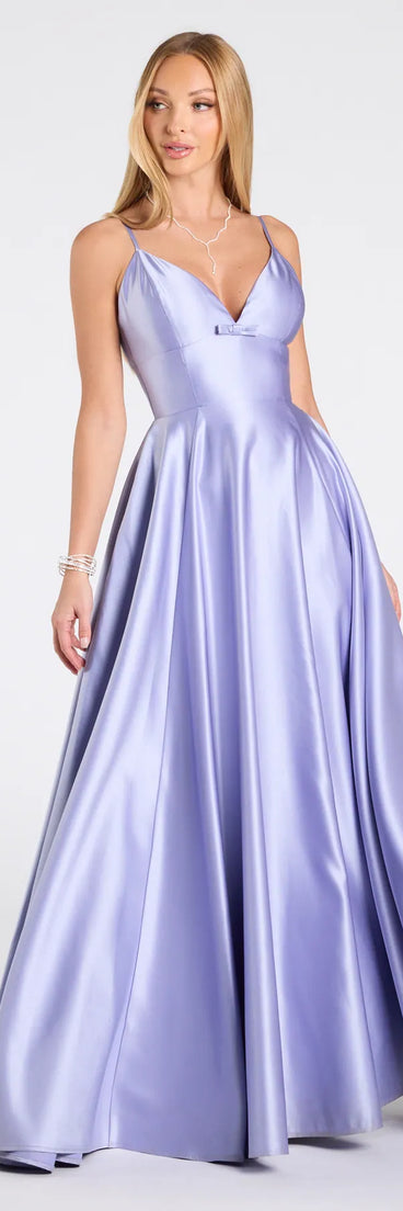 Step into the Prom 2025 dance in the Daniela Satin A-Line Ball Gown in periwinkle, a stunning blue prom dress designed to complement any theme with its timeless allure and statement-making style.