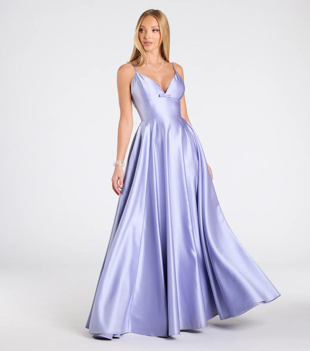 Step into the Prom 2025 dance in the Daniela Satin A-Line Ball Gown in periwinkle, a stunning blue prom dress designed to complement any theme with its timeless allure and statement-making style.