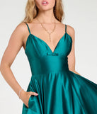 Own the spotlight in the Daniela Satin A-Line Ball Gown, a hunter green formal dress crafted to deliver luxe style for summer weddings, Army Balls, or any special event.