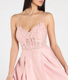 Make a bold statement in the Paloma Corset Applique A-Line Satin Ball Gown in pink, the perfect spring dress for weddings, cocktail hours, nights out, and/or seasonal celebrations.