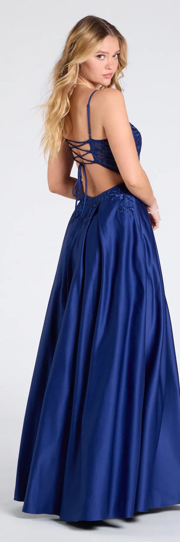Step into the Prom 2025 dance in the Myra Lace-Up Floral Embroidered A-Line Ball Gown in navy, a stunning blue prom dress designed to complement any theme with its timeless allure and statement-making style.