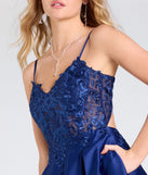 The Myra Lace-Up Floral Embroidered A-Line Ball Gown in luxe navy blue fabric, a stunning prom dress with statement details designed to make a bold impression at Prom 2025.