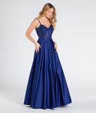The Myra Lace-Up Floral Embroidered A-Line Ball Gown in luxe navy blue fabric, a stunning prom dress with statement details designed to make a bold impression at Prom 2025.
