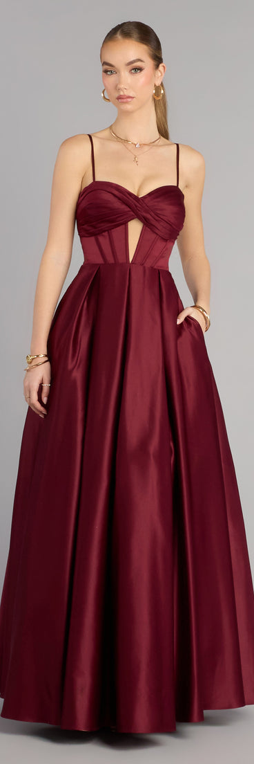 Pick a ball gown from Windsor for your next formal event or special occasion like the Gracelyn Satin Corset A-Line Gown in wine, featuring a voluminous silhouette, structured bodice, and elegant detail.