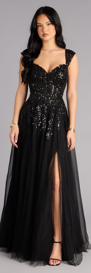 Pick a ball gown from Windsor for your next formal event or special occasion like the Ashley Applique Lace-Up Tulle Ball Gown in black, featuring a voluminous silhouette, structured bodice, and elegant detail.